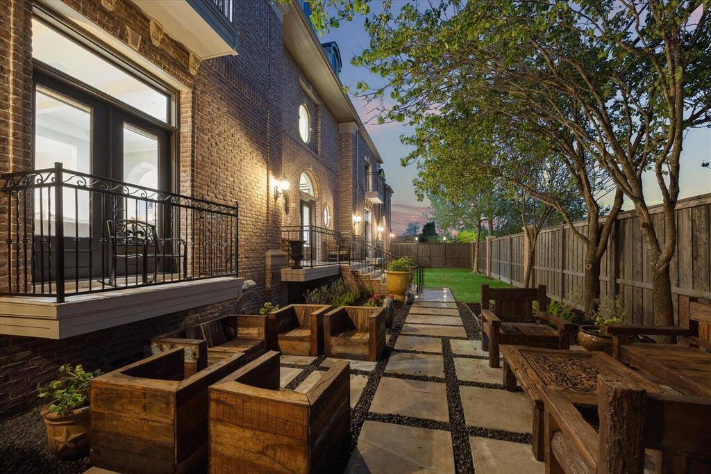 Large side yard and Patio with green space
