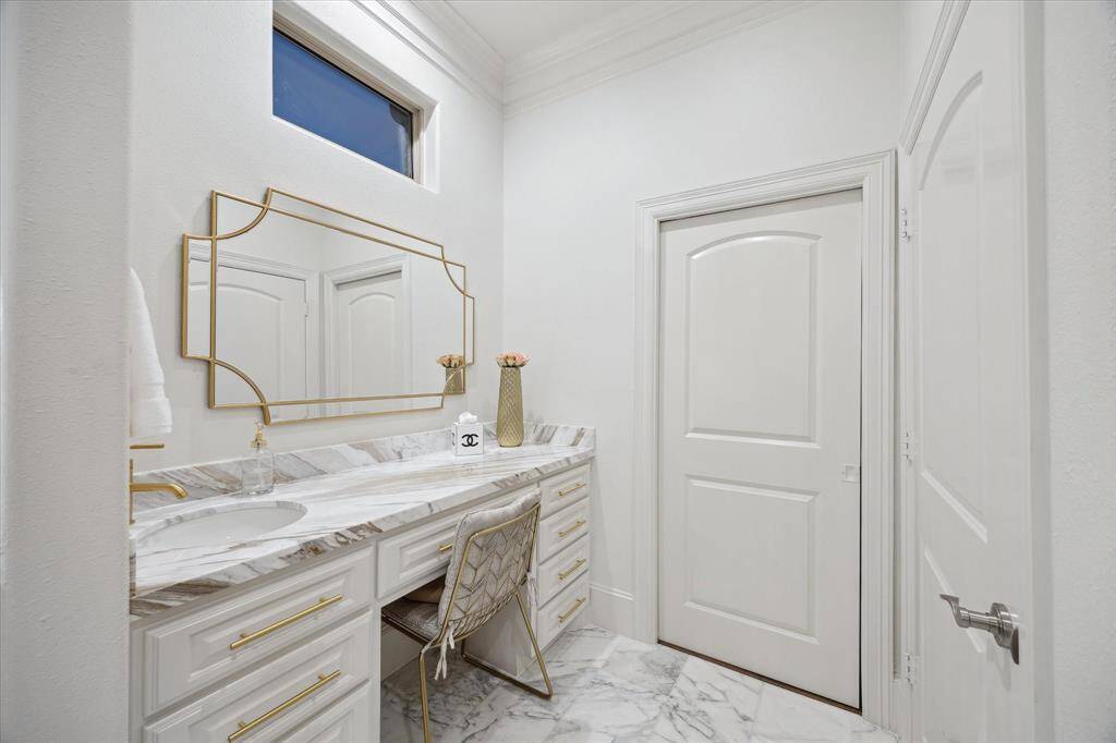 Primary Bathroom vanity space with its own sink