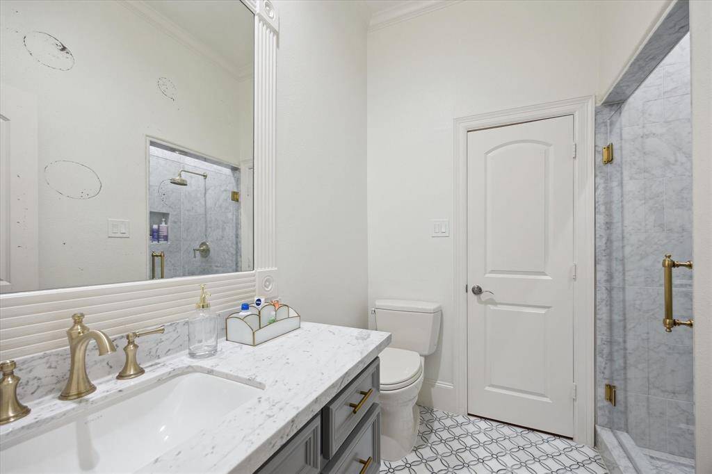 Secondary Bathroom with a large walk-in shower