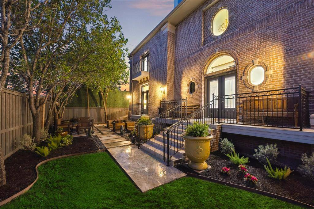 Side yard Patio beyond the green space