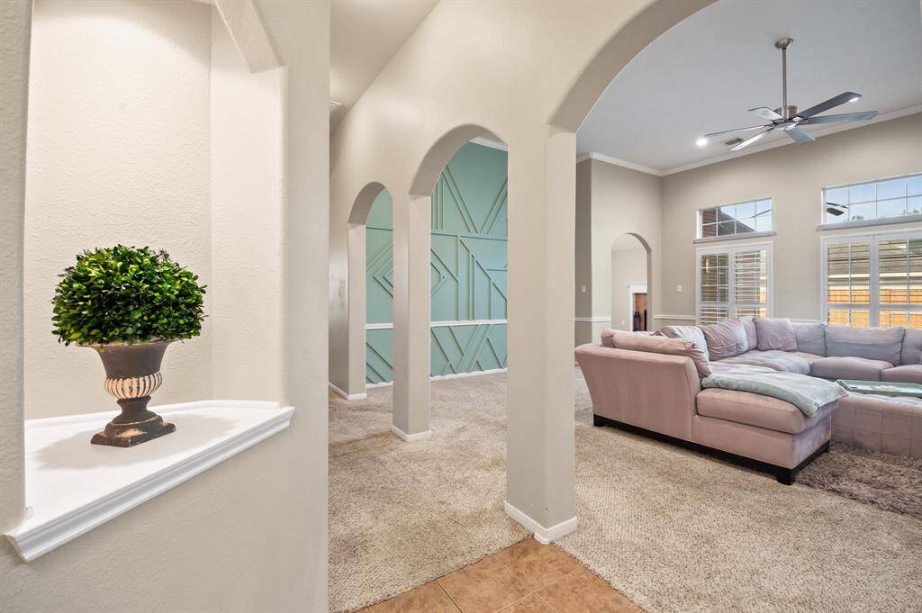 Foyer Entry with columns to Family room