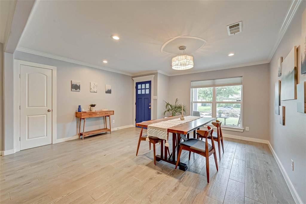 Another view of the dinning room with a hall closet.