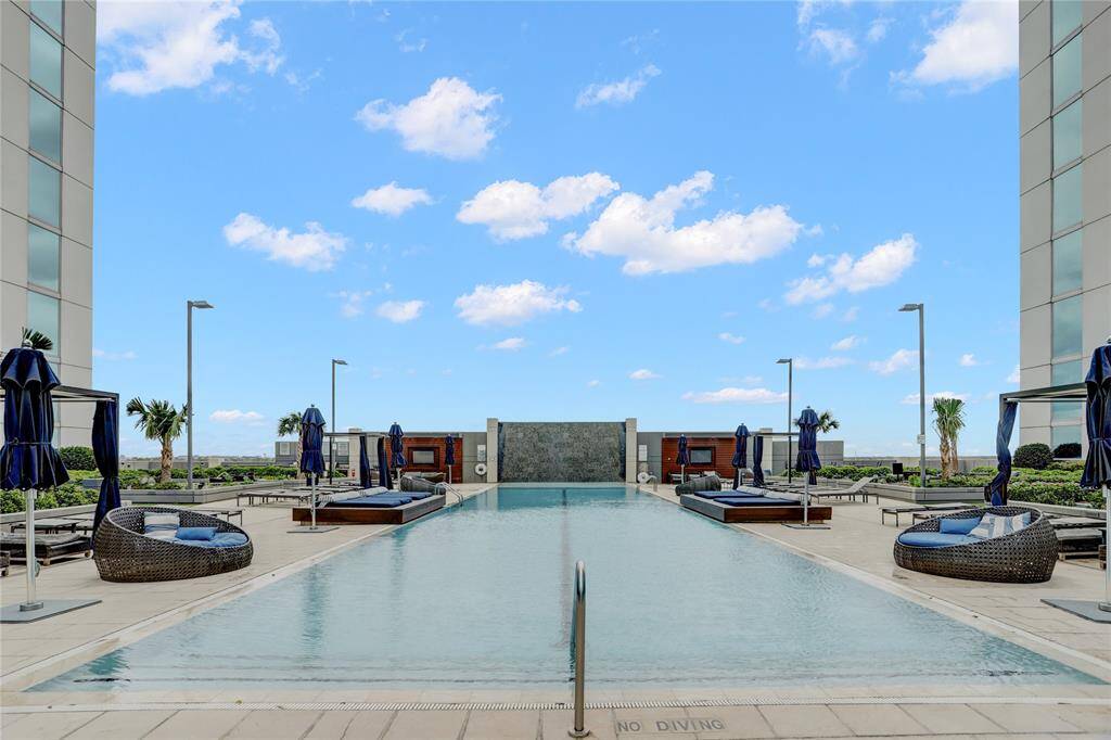 The infinity pool features excess seating and cabanas for the ultimate relaxation.