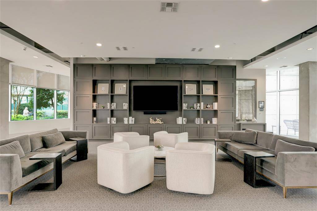 Ample lounge seating, an oversized bar, tables for eating & a pool table.