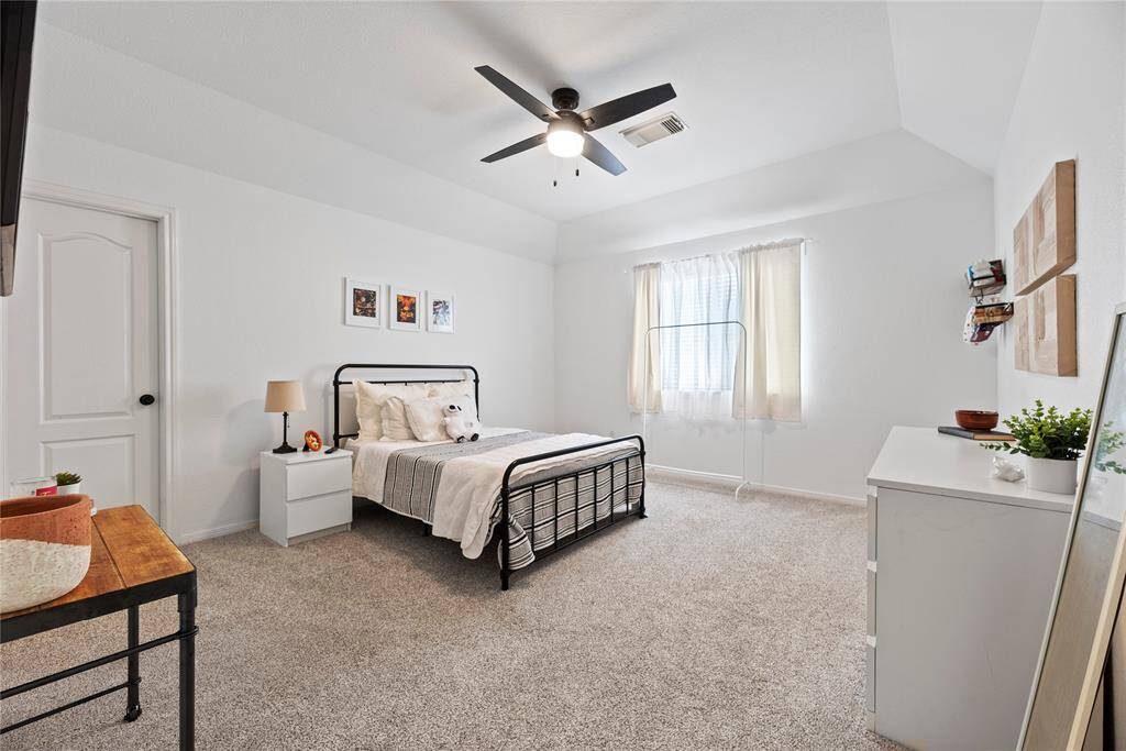 The thoughtfully designed layout of your second bedroom allows for natural light to flood the room, creating a warm and welcoming atmosphere.