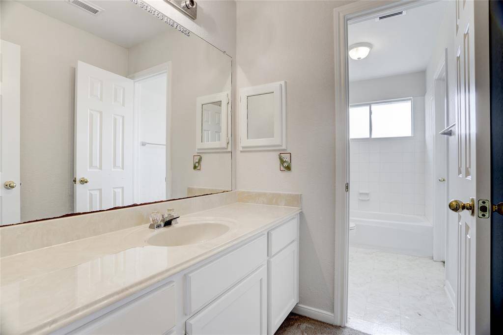 Upstairs secondary bathroom.