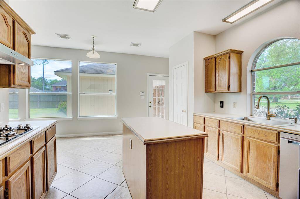 Kitchen is open to the breakfast area.