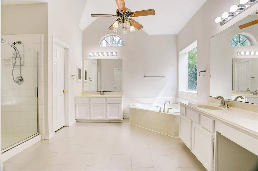 Primary bathroom is open and bright!