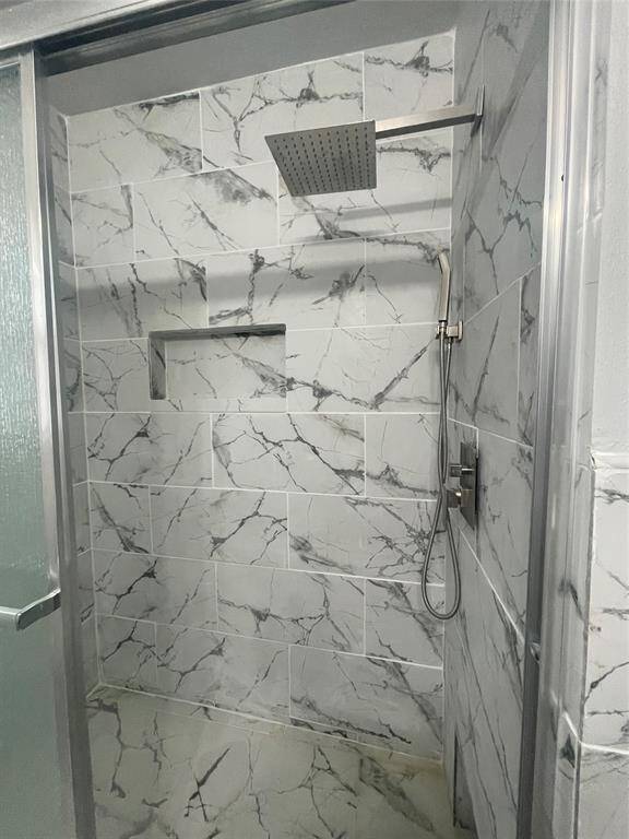 New shower and hardware in bathroom.