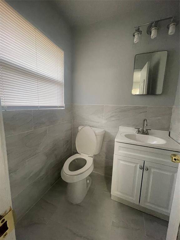 Half bath located in the Primary Suite.