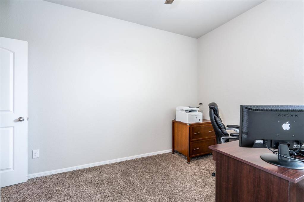 Bedroom 3 features carpet.