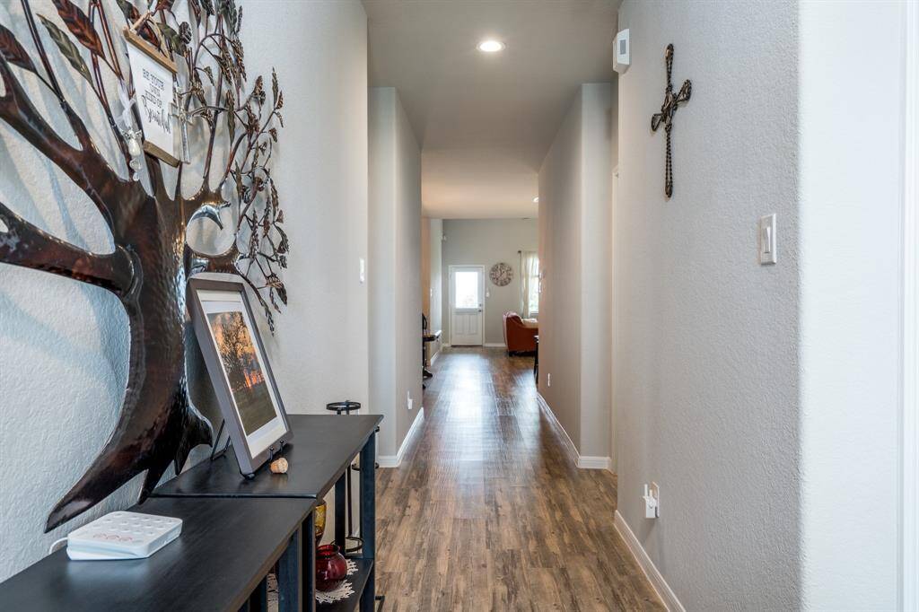 Lovely foyer greets your guests & welcomes you into this meticulously cared for home!