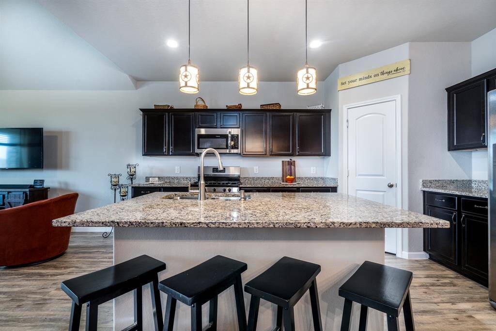 Kitchen island allows for extra seating!