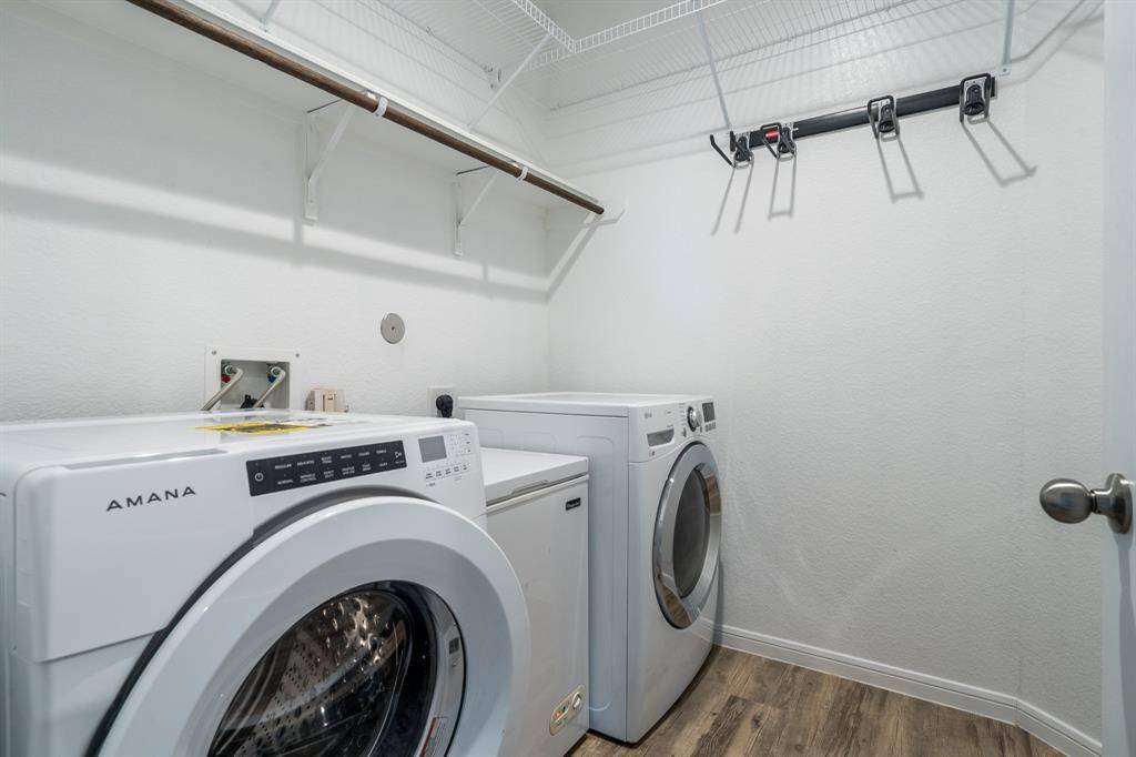 Laundry room has storage shelves (washer & dryer do not stay).