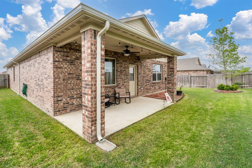 Great lot with covered patio and grass!