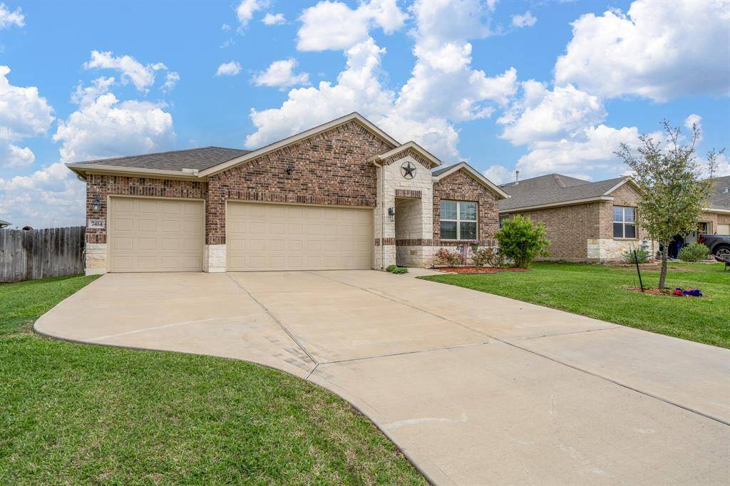 3-Car garage, perfect for golf cart parking!
