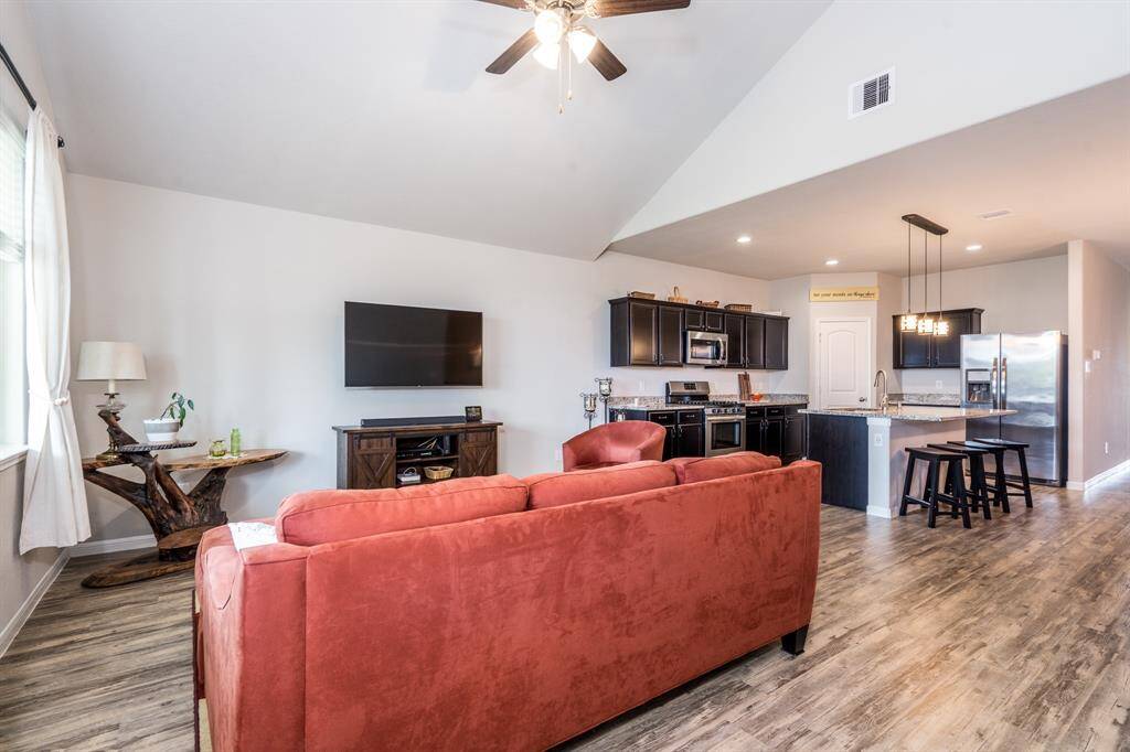 Stunning luxury vinyl plank floors flow through main areas of home.