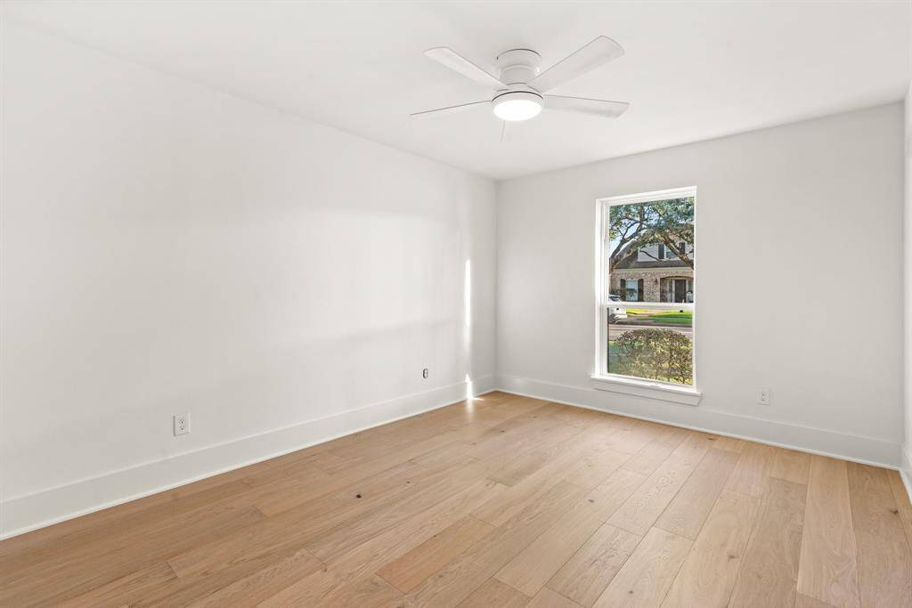 A spacious, light filled second bedroom.