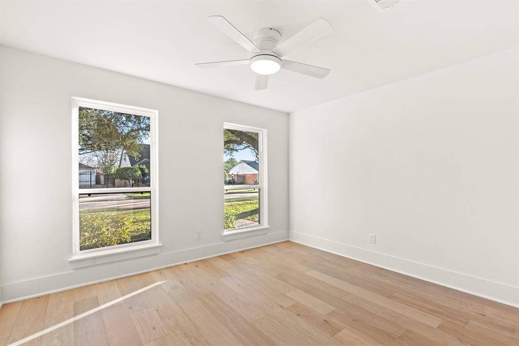 A fourth bedroom. Each of the additional bedrooms is equipped with new ceiling fans, ensuring comfort throughout.