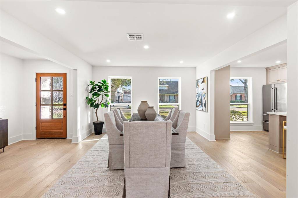 A generous dining room with easy access to the kitchen and living room.