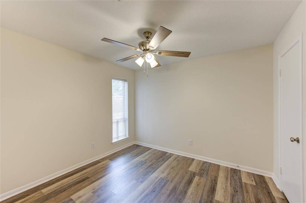 Bedroom 2:  This bedroom is off of the family room and could make a great gameroom, office, or certainly a 4th bedroom.  All bedrooms have ceiling fans and window blinds.