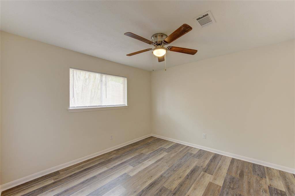 Bedroom 4:  All bedrooms have ceiling fans and window blinds.