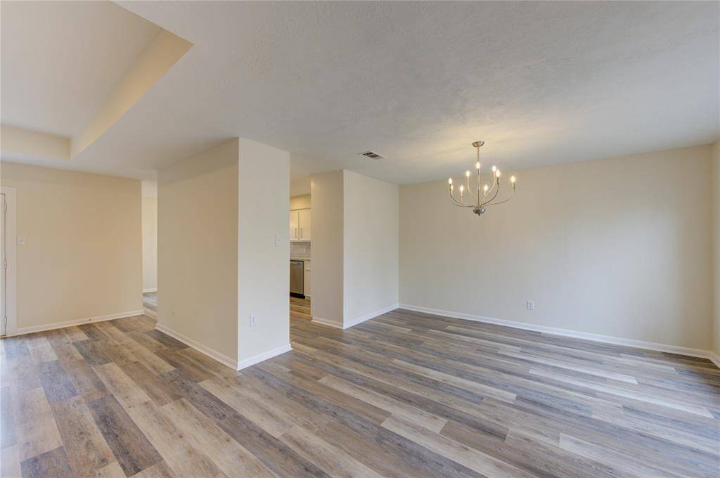 Entering the home you will find the formal dining to the right and family room to the left. The entire home as all-new flooring, fresh paint, and new light fixtures and hardware!