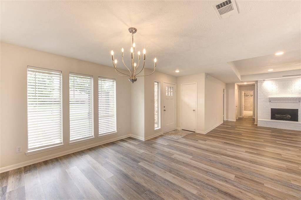 Another view of the formal dining and family room areas.