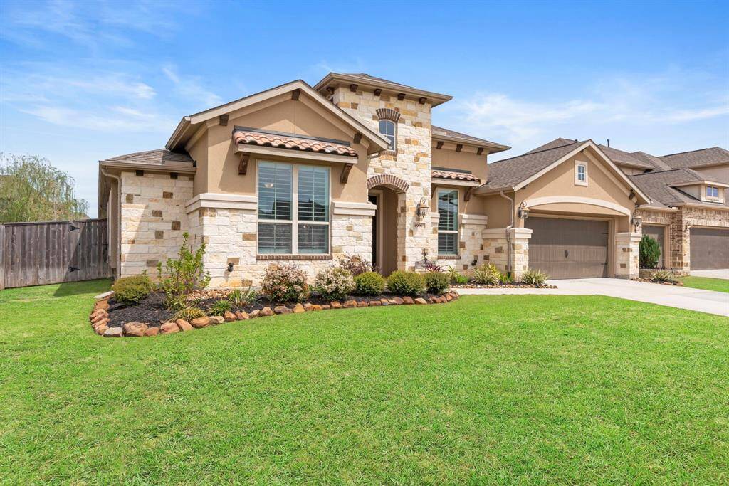Enjoy the perfect blend of privacy and space with this beautiful home situated on a generously sized lot.