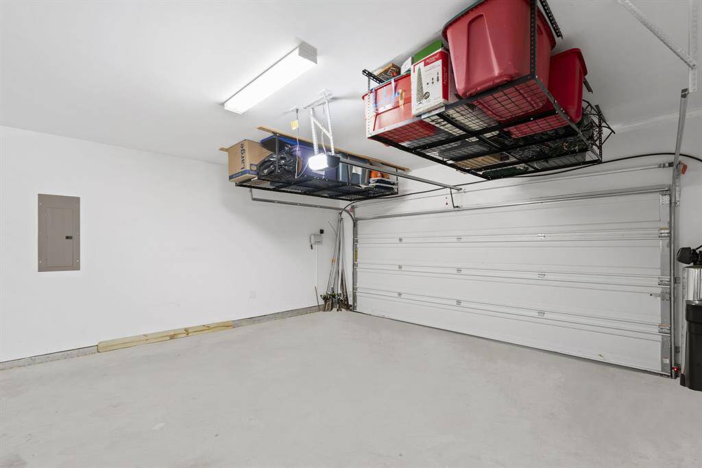 Wi-Fi/Bluetooth-connected sprinkler system that lets you control watering schedules from your smartphone. Home also includes a high-quality water softener. Plus, the garage storage racks will remain, offering extra storage space.