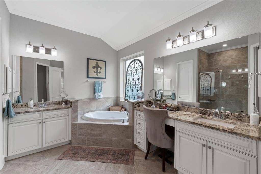 Step into luxury with the beautiful double vanities and a dedicated vanity area-perfect for added convenience and storage.