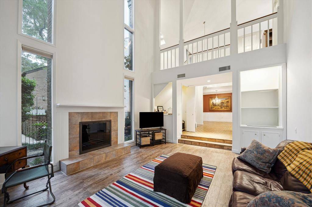Family Room with great, high ceilings, and tons of natural light