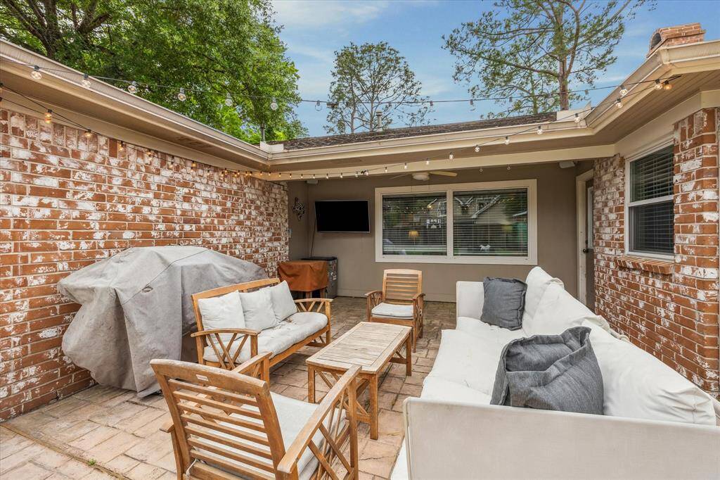 Inviting patio with room for sitting and entertaining.