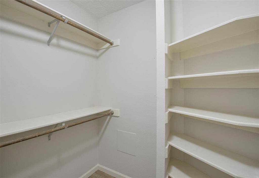 Enormous Walk-In Primary Closet.