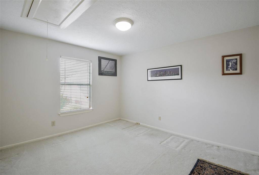 Secondary Bedroom with Attic Access.