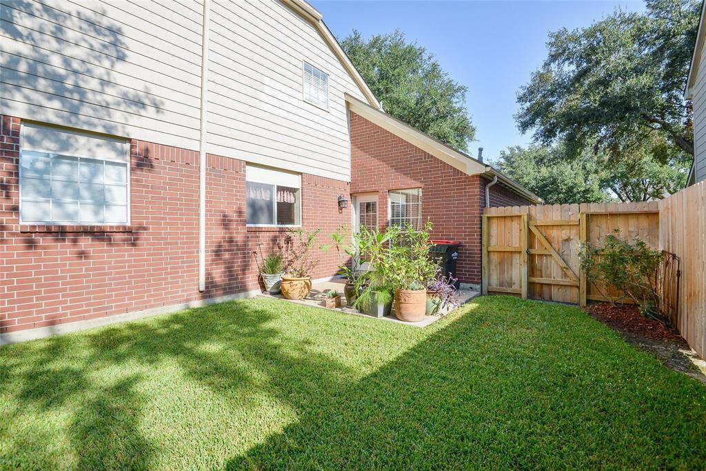Side Yard with Easy Access to Kitchenette/Office.