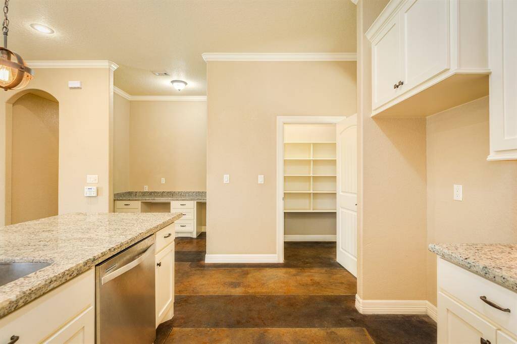 Views from the kitchen of your walk in pantry and your designated office area. Perfect for those who work from home or home school.