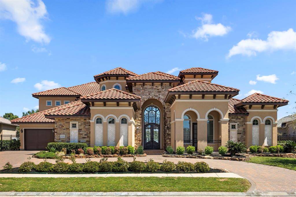 Mediterranean architecture lends itself to the incredible details you will find throughout the estate. An arched stone portico welcomes you to beautiful iron doors.