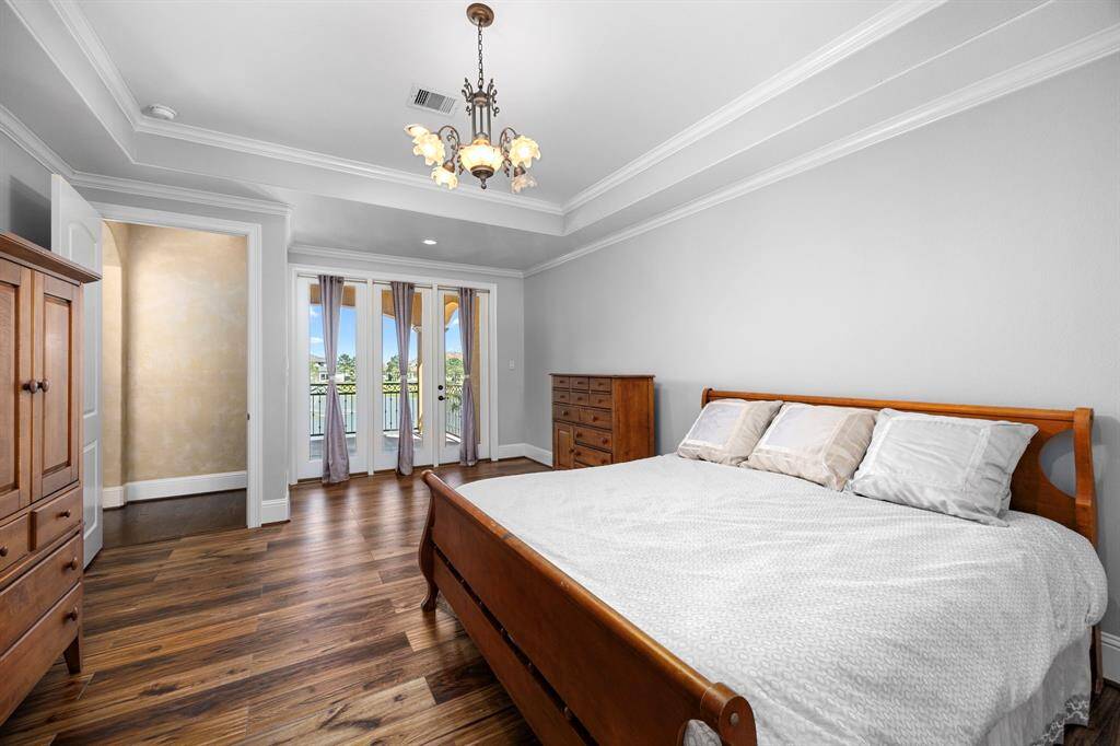 Bedroom suite 3 is located upstairs on a private wing & offers an expansive veranda with views of the morning sun rising over the lake. This suite features tray ceilings, luxury flooring, a grand en-suite bathroom & custom designed closet that adds to the lavish details you would expect.