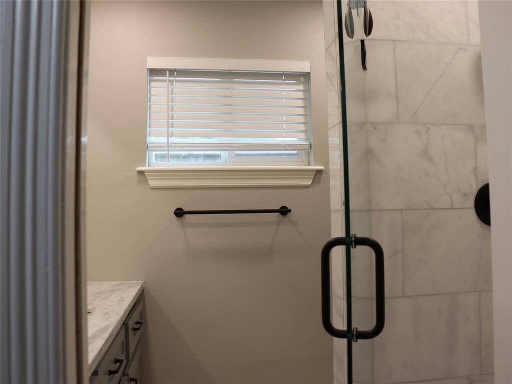 Primary bath with tiled shower