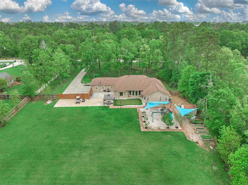 The property is set back from the road and offers so much privacy. The large driveway can accommodate multiple cars and the double gate means you can bring that boat or RV!