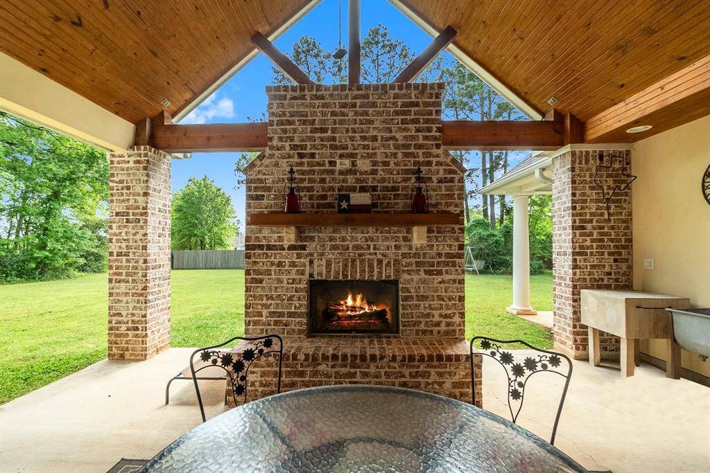 Brick hearth with gas fireplace and vaulted ceilings.