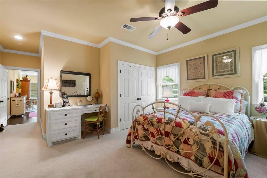 Bedroom 4 in guest suite with adjoining full kitchen.