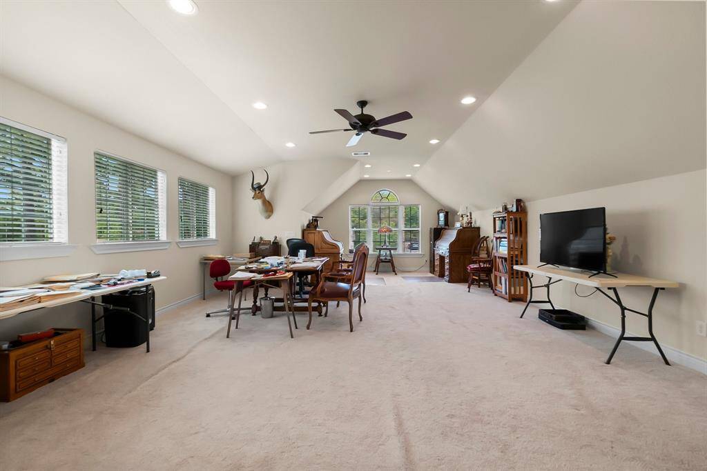 Bonus room upstairs as a home office.