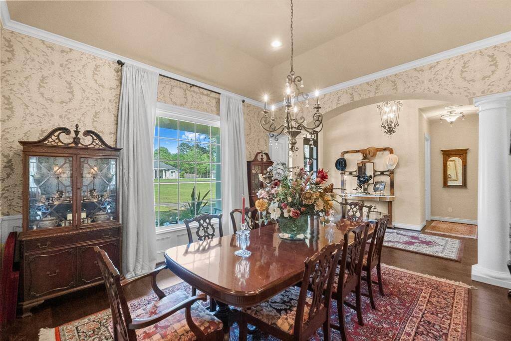 Dining room with elegant wallpaper and lighting