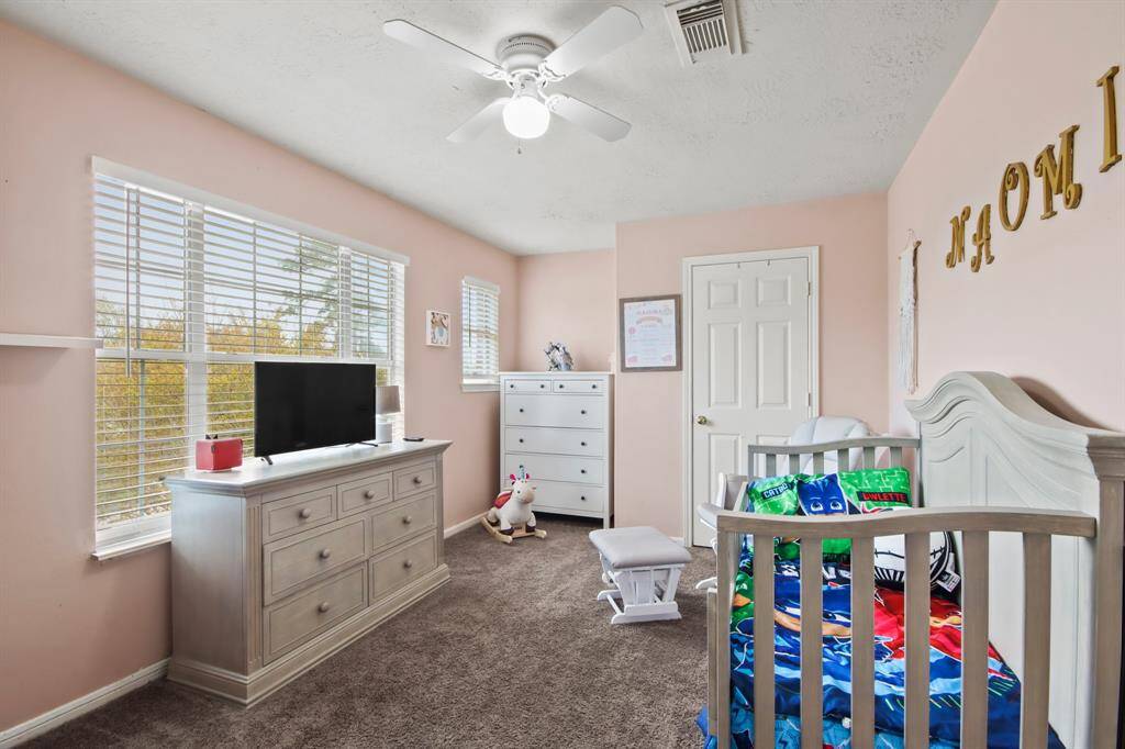 The thoughtfully designed layout of your second bedroom allows for natural light to flood the room, creating a warm and welcoming atmosphere.