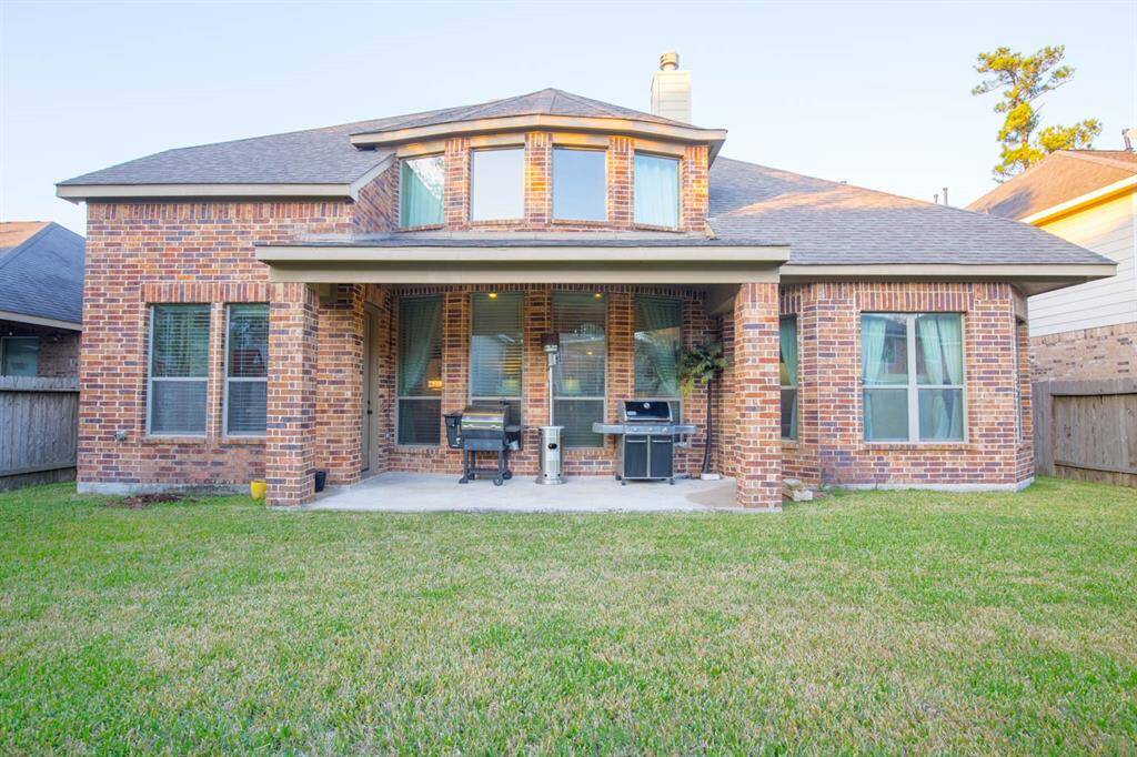 Large back patio, note the brick all around the home