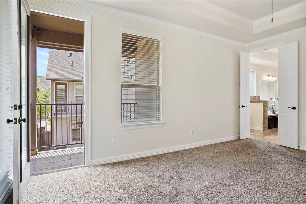 Staircase off of the kitchen and  living areas.