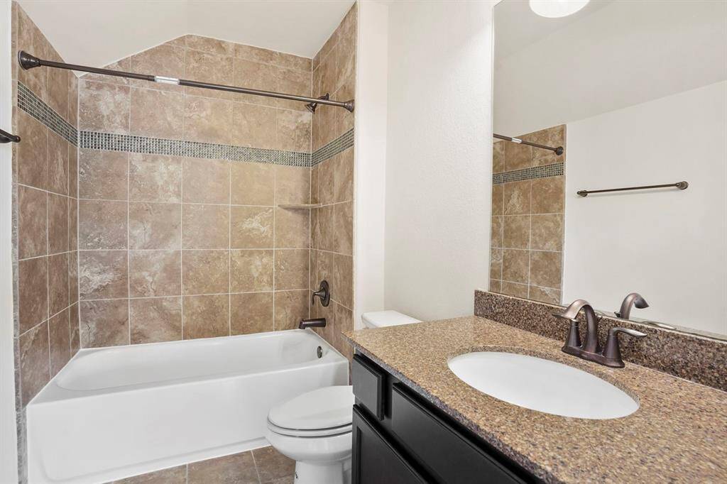 Laundry room is located on the second floor.  Notice the sink.