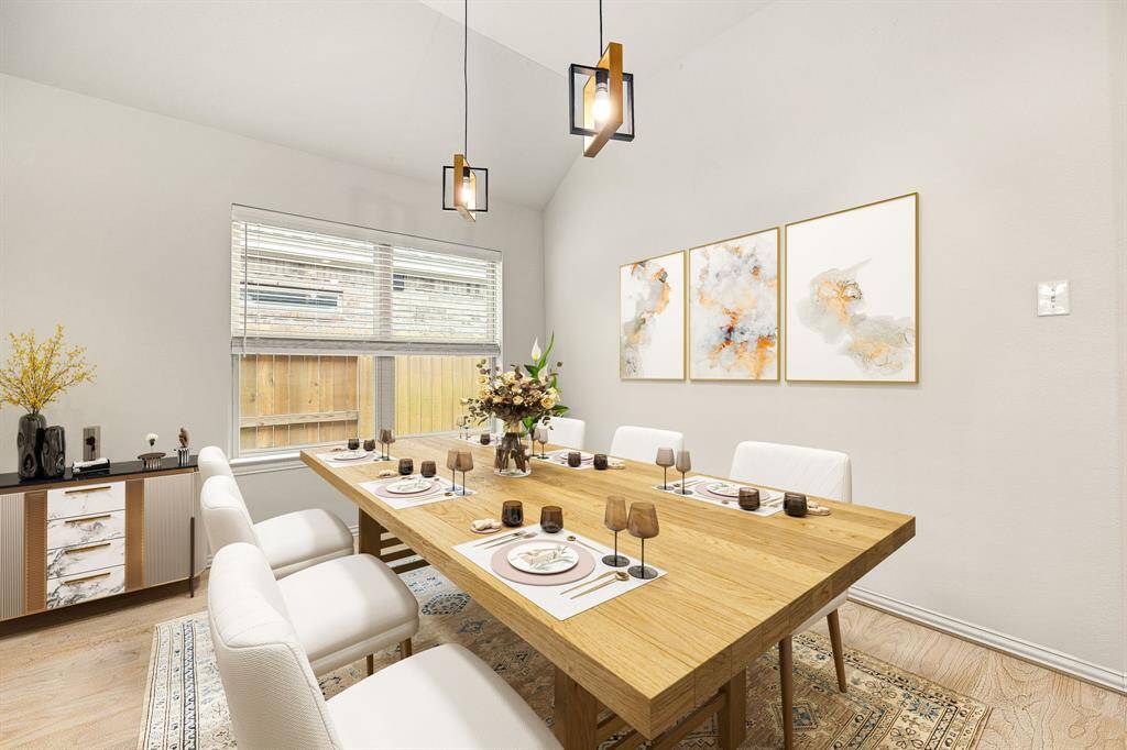 Make memories gathered around the table with your family and friends! This dining room features high ceilings, crown molding, chair rail, large windows, plush carpet and a beautiful chandelier. *Virtually Staged
